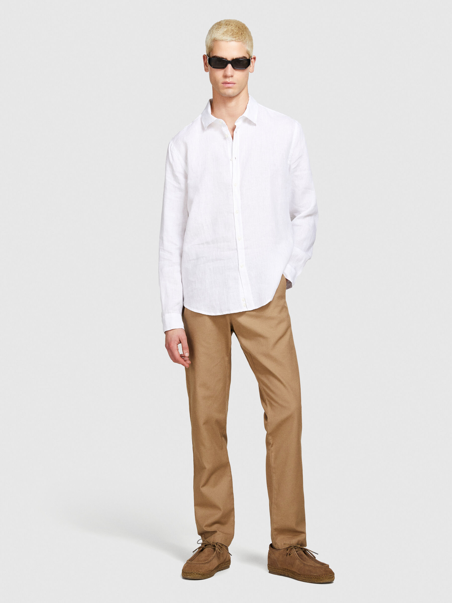 White linen shirt khaki pants top