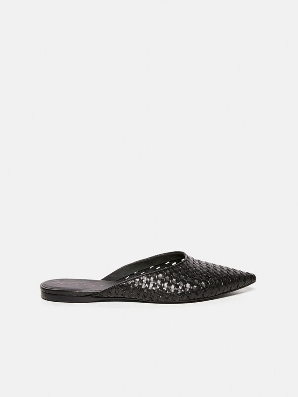 Mules in braided leather - women's flat shoes | Sisley