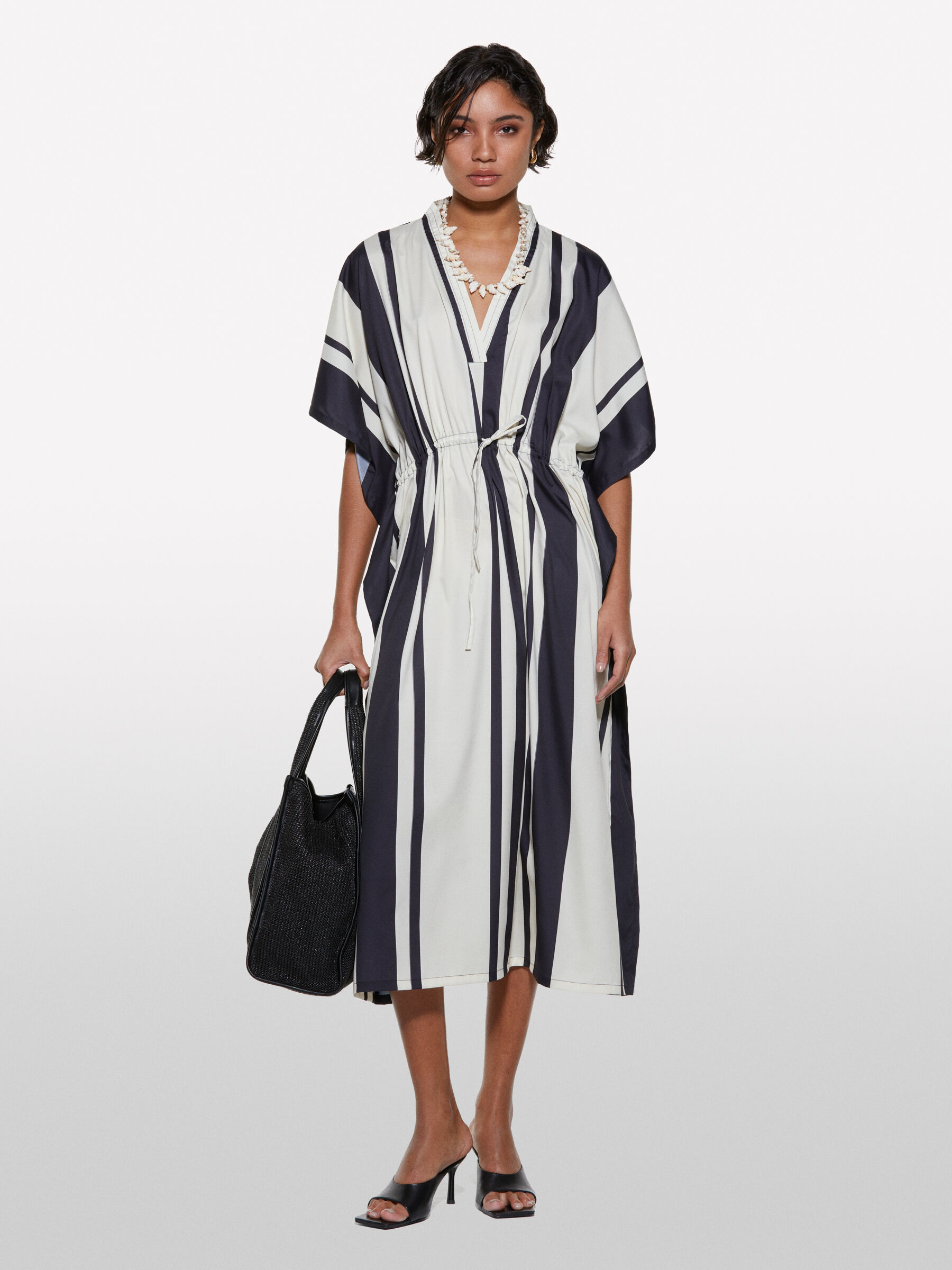 Women's elegant and casual dresses by Sisley
