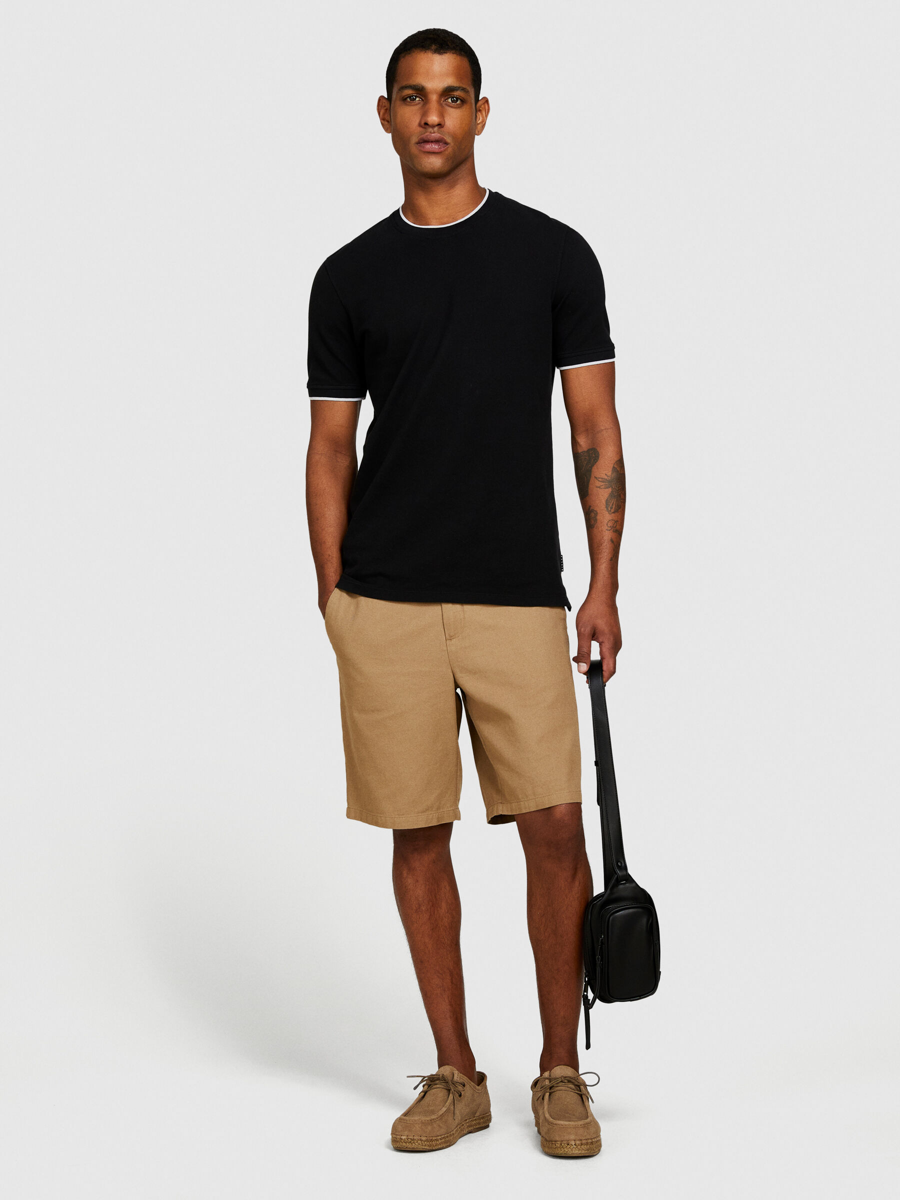 Black t shirt khaki shorts top