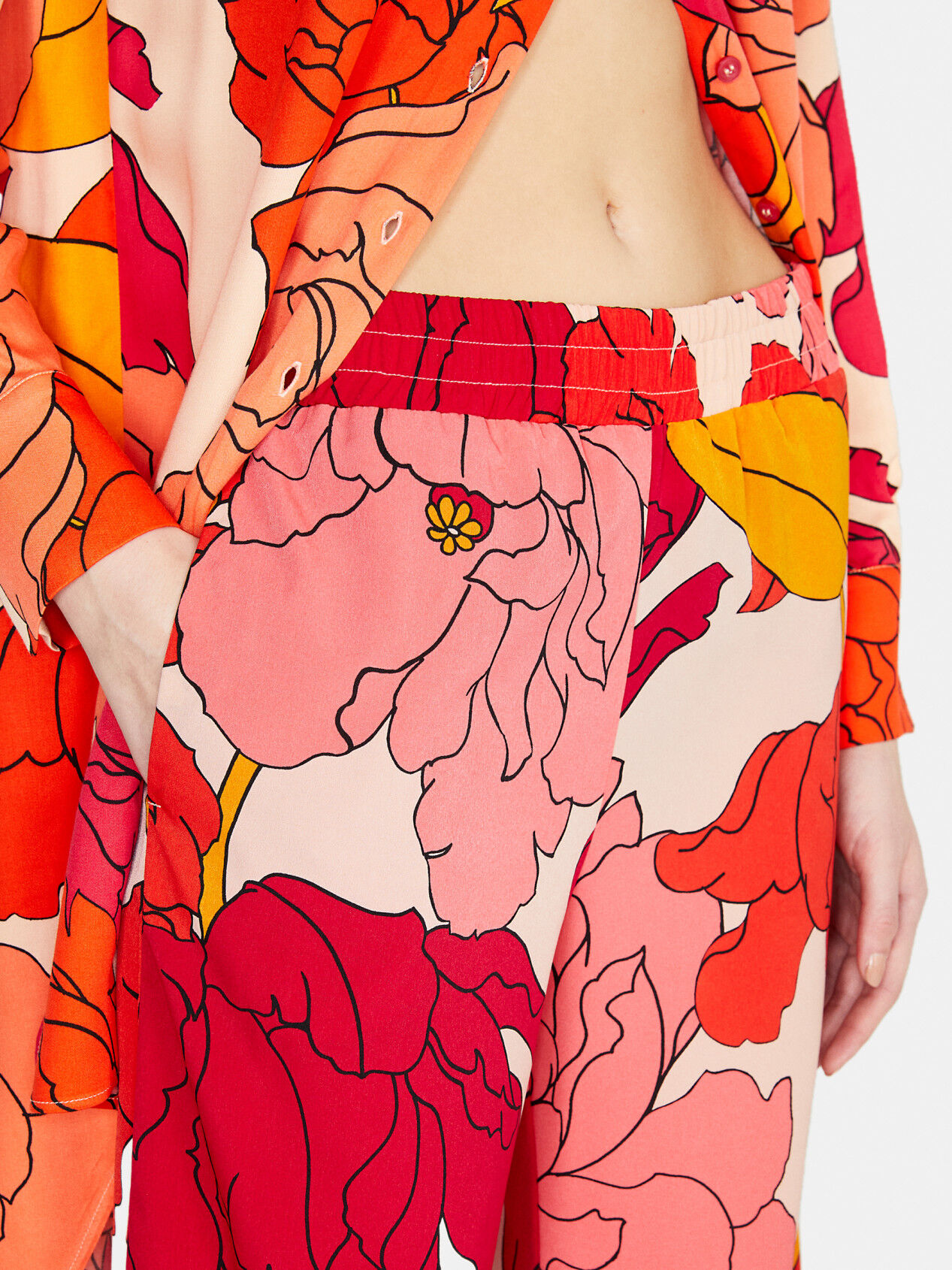 Thom Browne Navy Slim Fit Floral Print Trousers, $1,006 | oki-ni | Lookastic