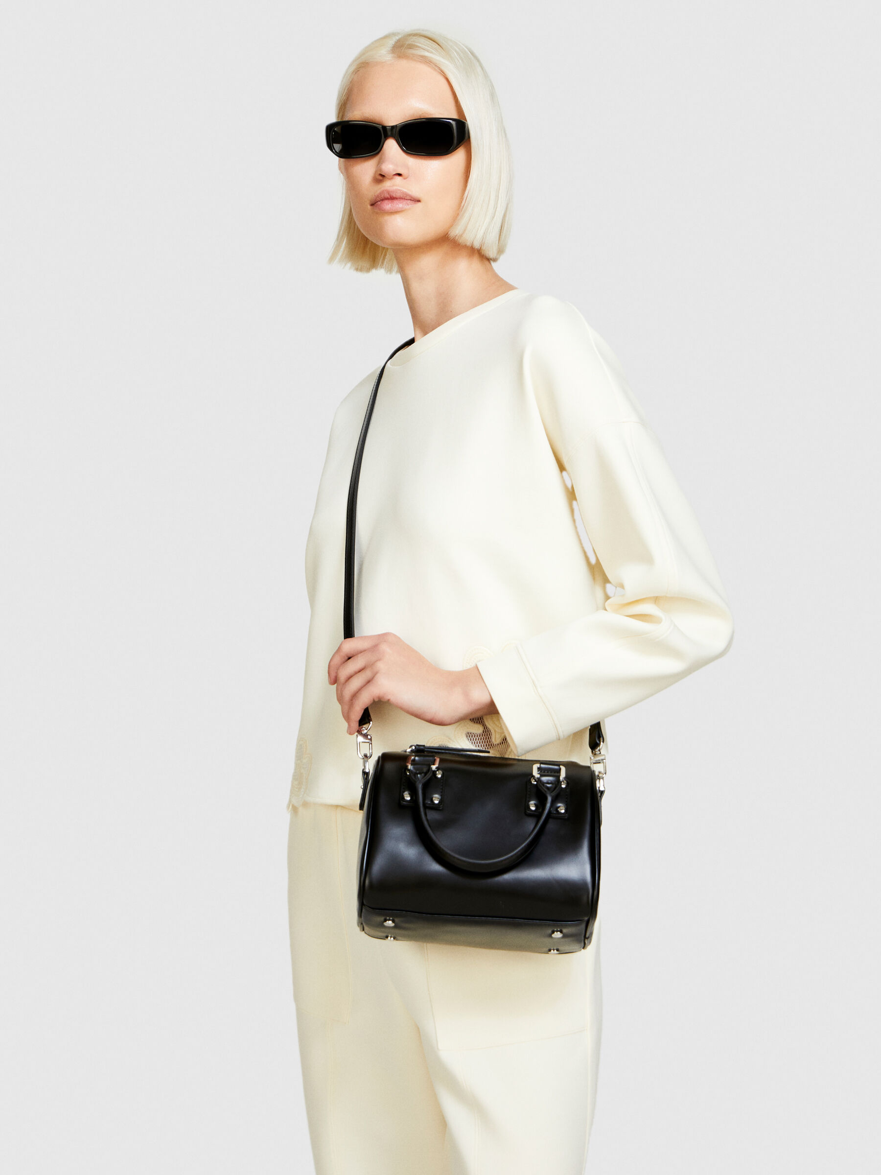 Women s Bags in leather and fabric by Sisley
