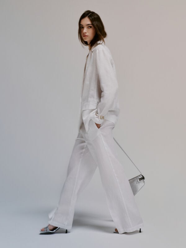 White flare fit trousers in 100% linen - women's palazzo trousers | Sisley