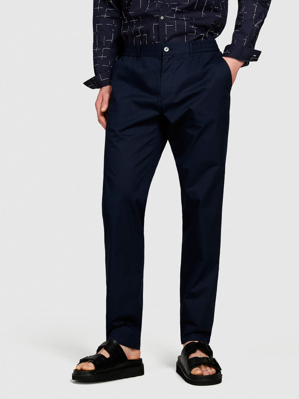 Tapered fit trousers Men image number null