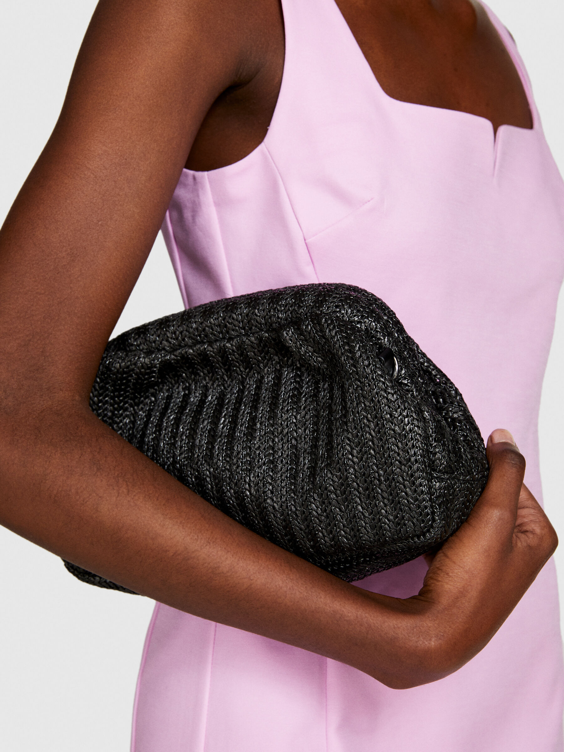 Black straw clutch bag top