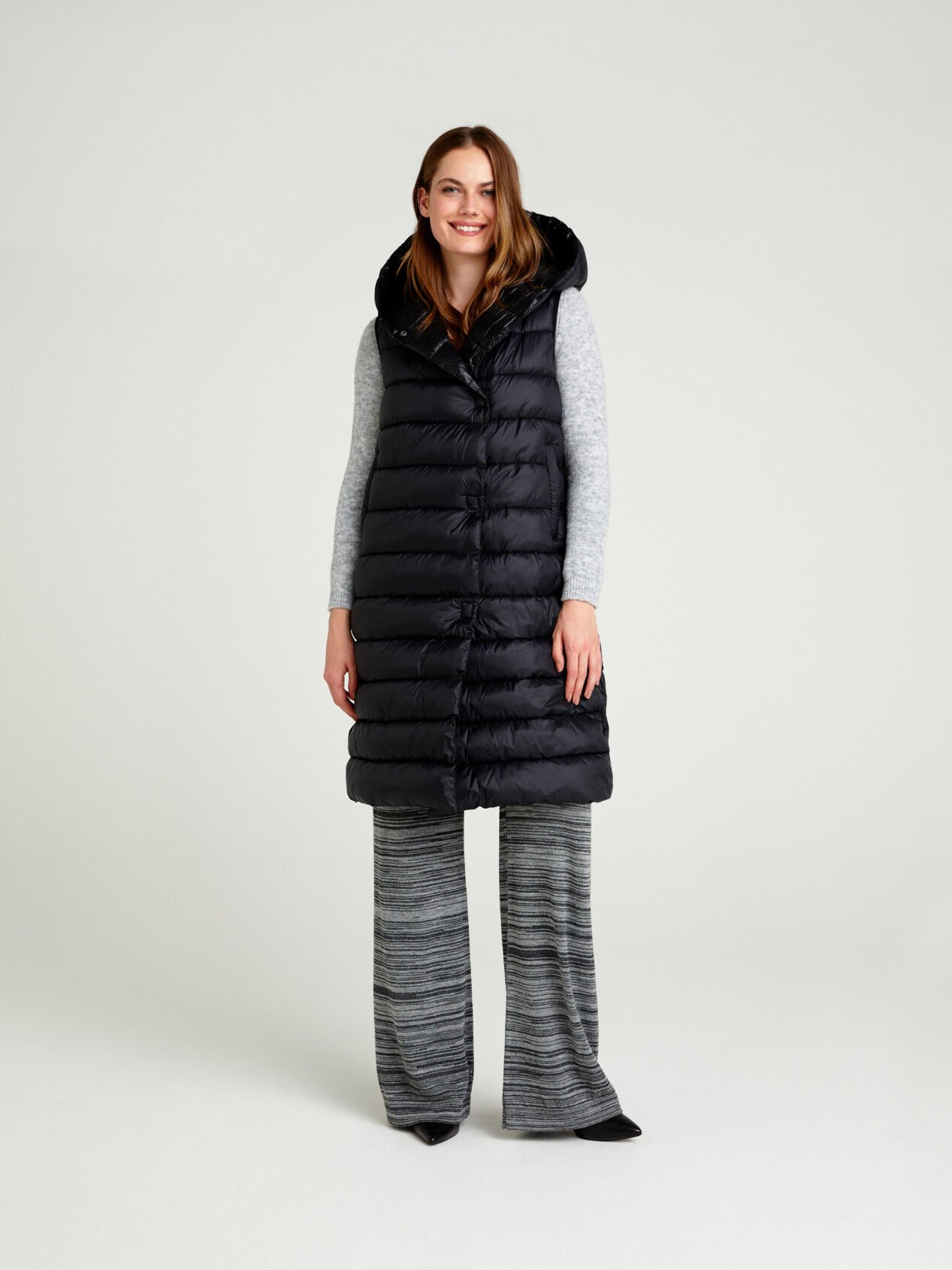 long black sleeveless jacket