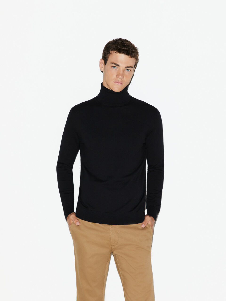 Solid colored sweater with high collar