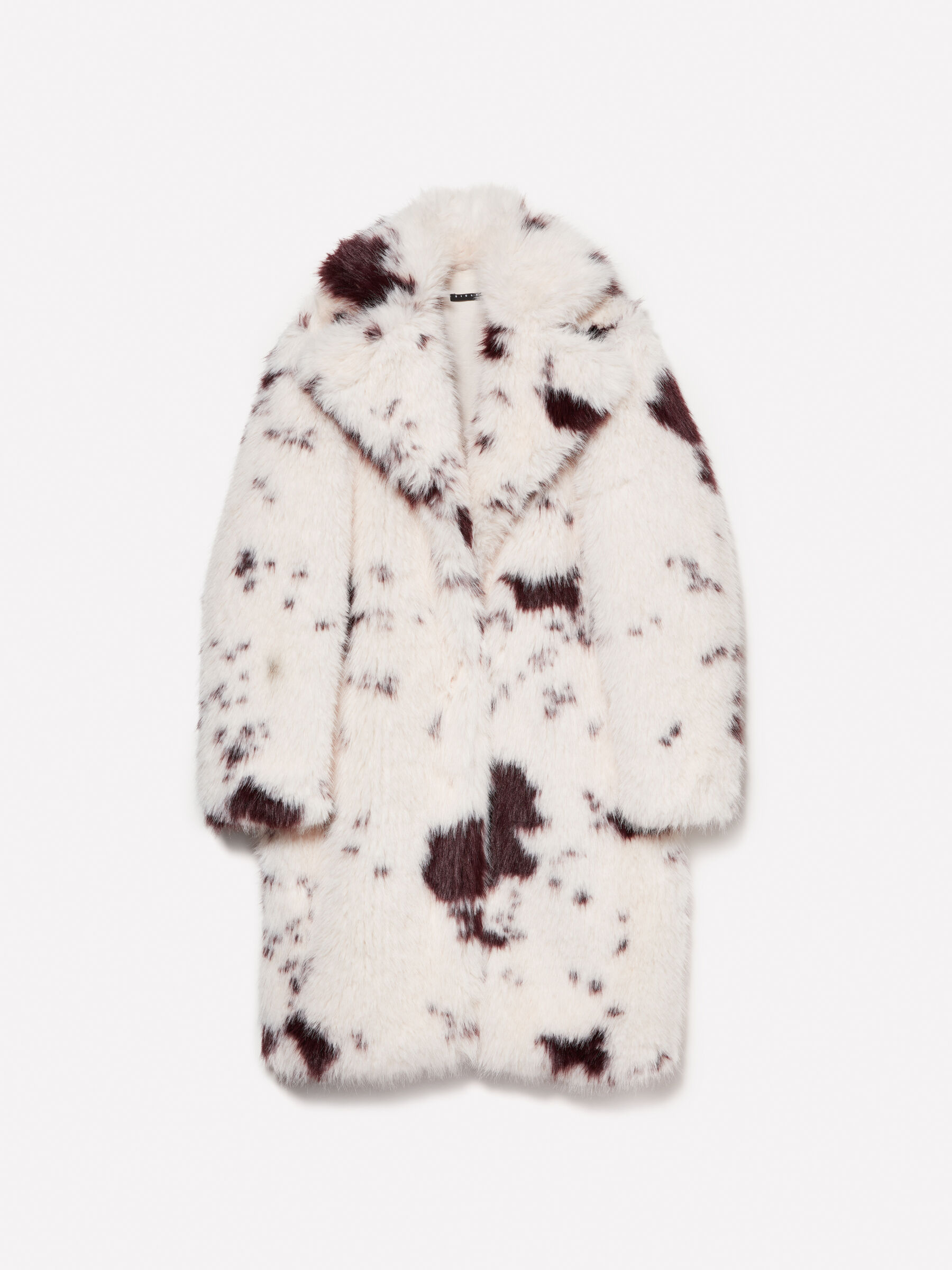 White fur coat with black spots on sale