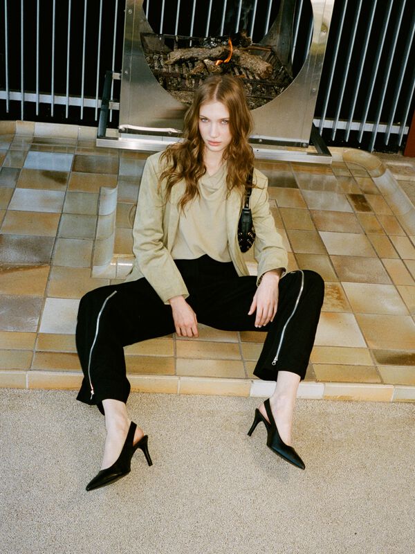 Black palazzo trousers with zipper - women's palazzo trousers | Sisley