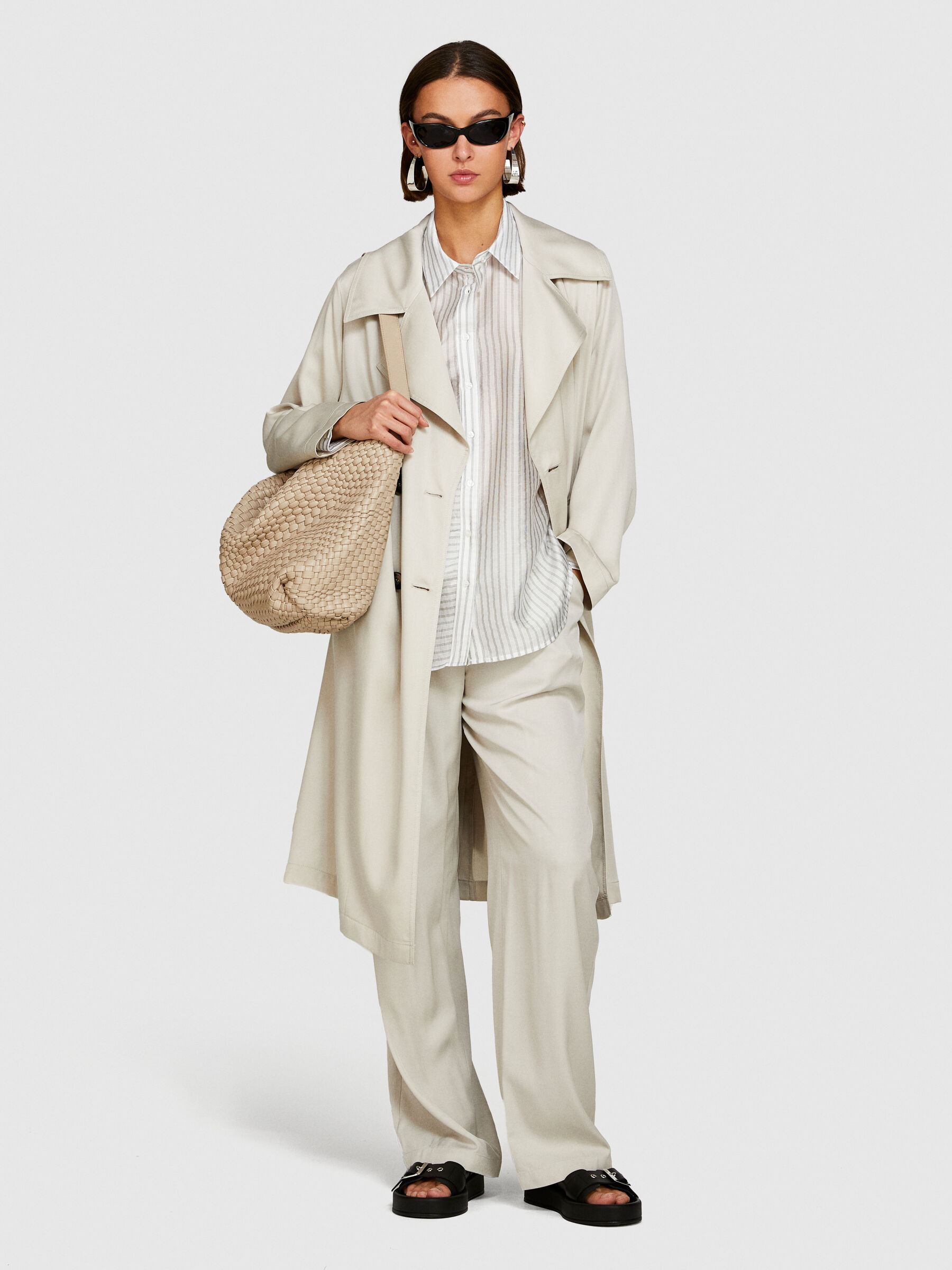 Low-waisted flared fit trousers Women image number null