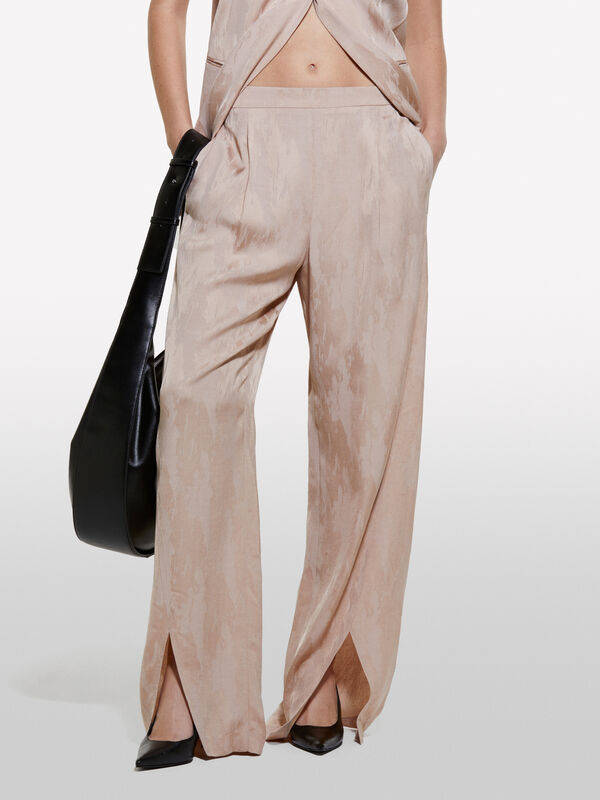 Light pink trousers with slits - women's palazzo trousers | Sisley