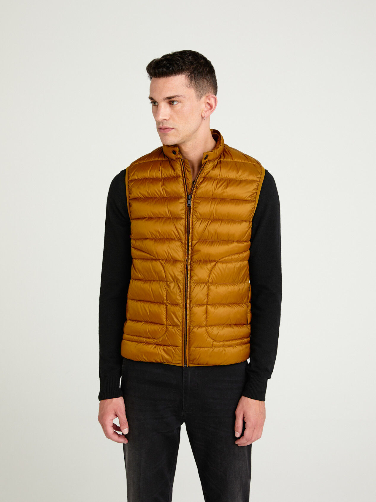 mustard sleeveless jacket