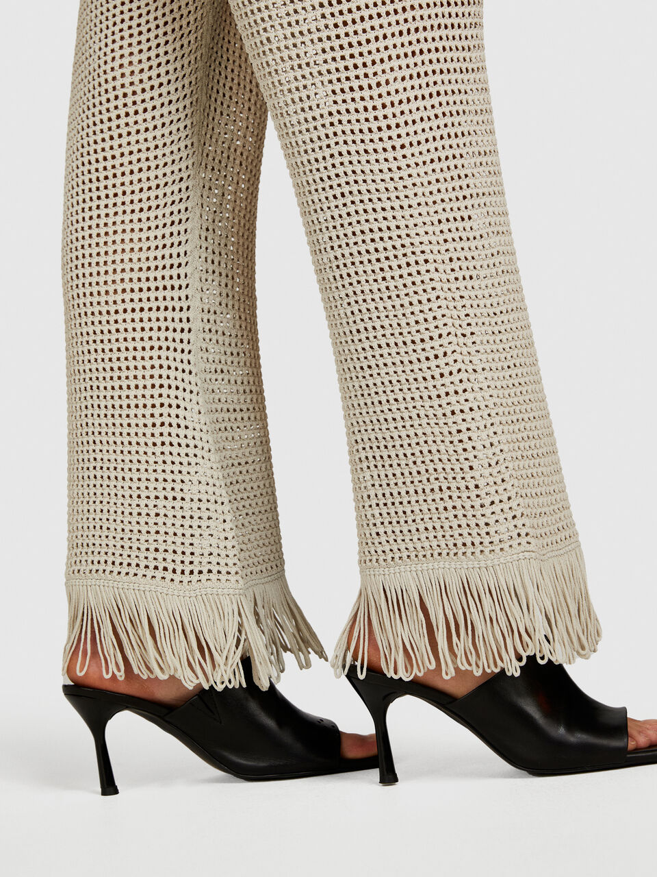 Perforated trousers with fringe Women image number null