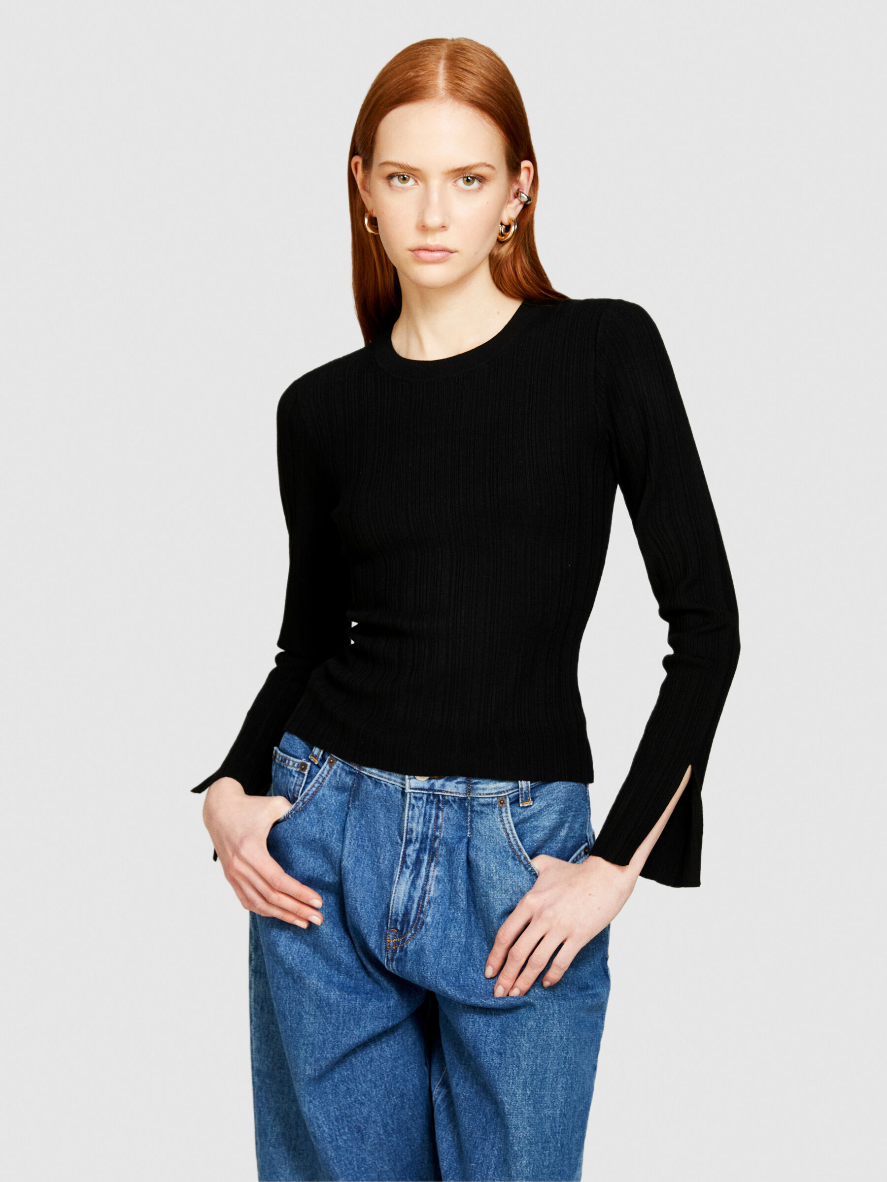 Muscle fit ribbed sweater top