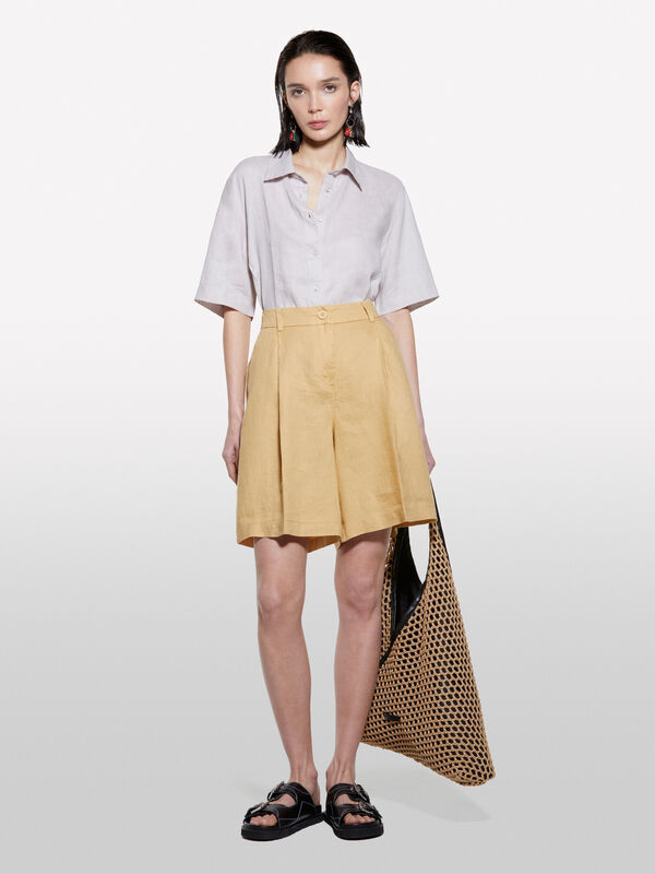 Mustard bermudas in 100% linen Mustard bermudas in 100% linen - women's shorts | Sisley