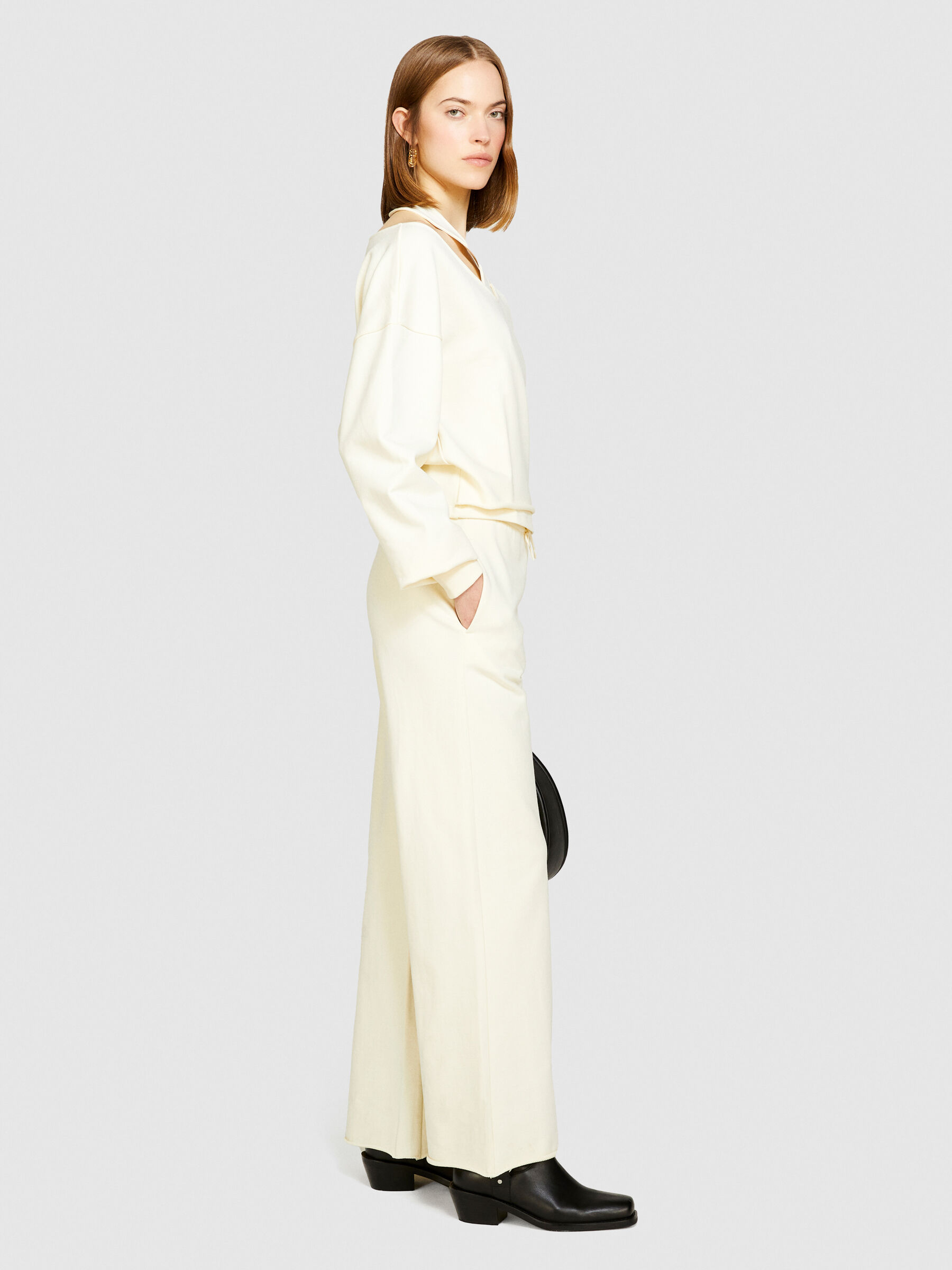 White flare sweatpants on sale