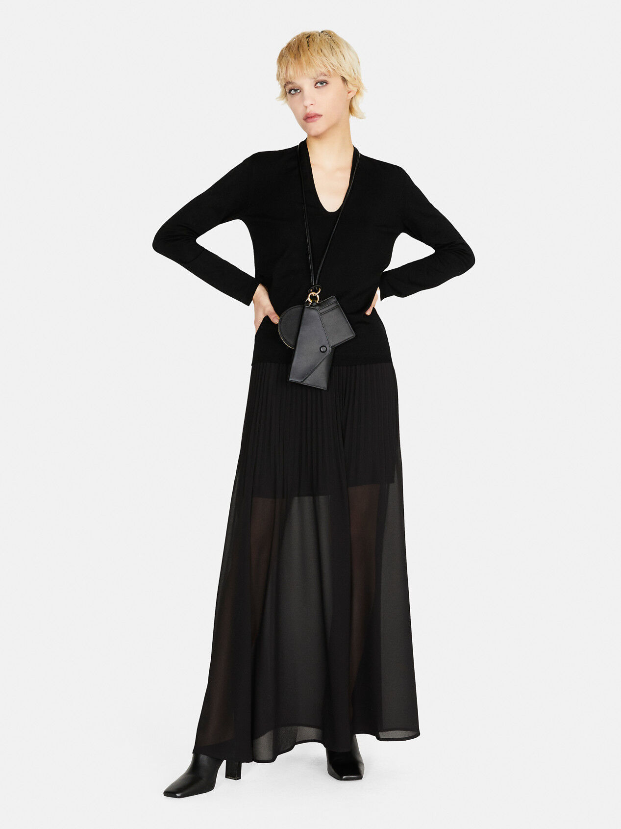 Plunging neckline sweater deals